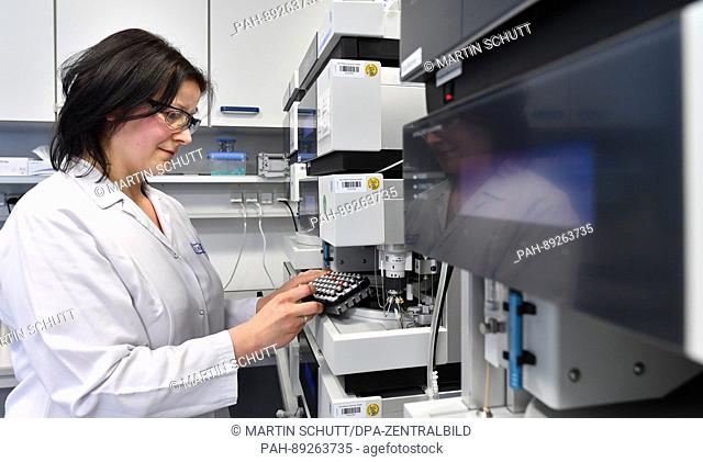 Chemical lab technician Romy Kuenzel at work in a laboratory of the Aeropharm GmbH in Rudolstadt, Germany, 15 March 2017