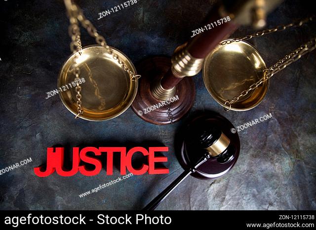 Judges wooden gavel, on wooden table background