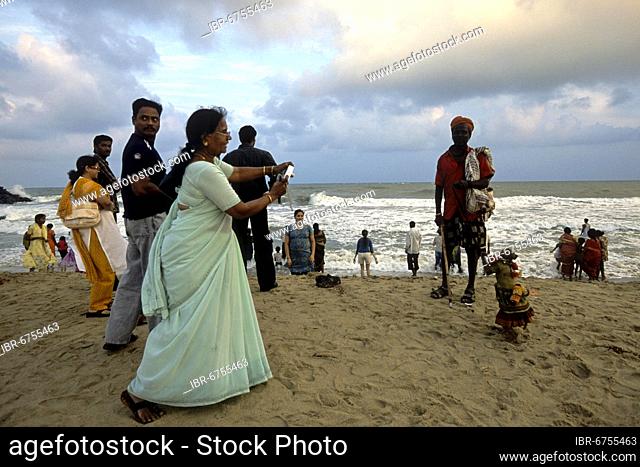 Tourists in Mahabalipuram beach near Chennai; Madras, Tamil Nadu, South India, India, Asia