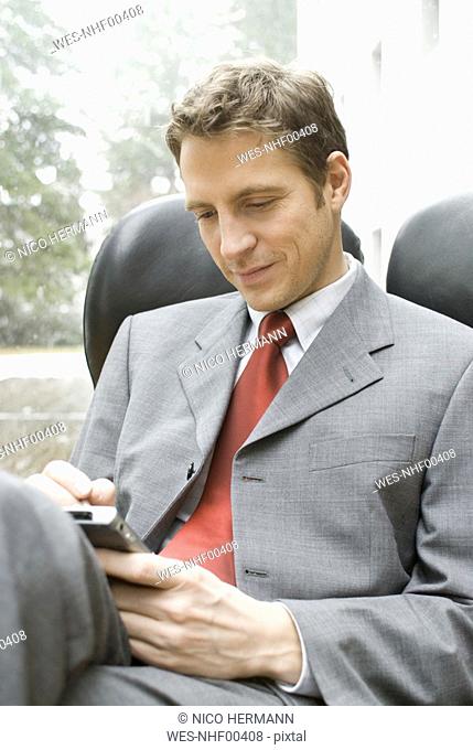 Businessman with palmtop