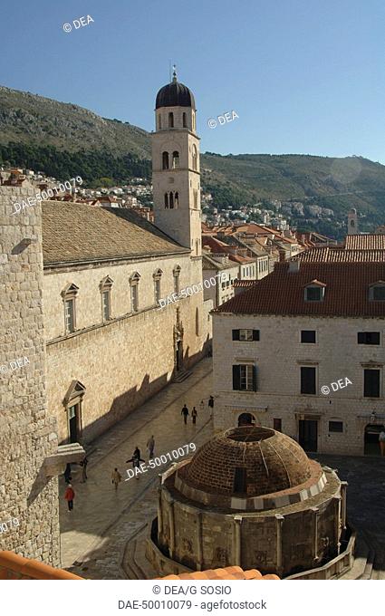 Croatia - Dalmatia - Dubrovnik. Historical Dubrovnik (UNESCO World Heritage List, 1979, 1994). Cloister at Dominican Monastery and Onofrio's Fountain at Pile...