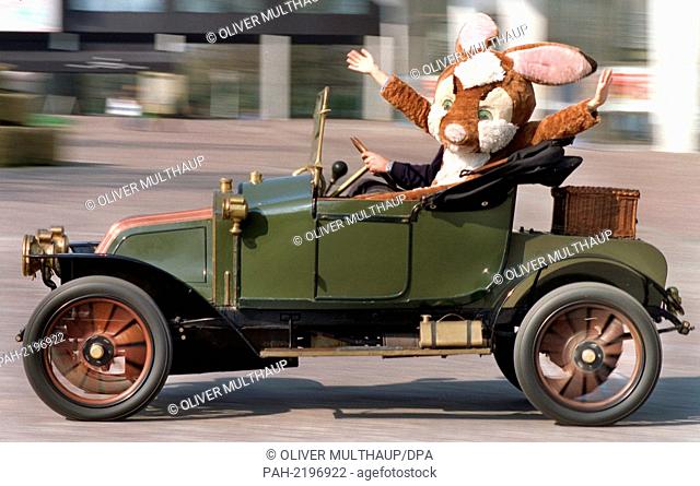 In a hurry this ""Easter Bunny"" seems to be traveling with a Renault EK Cabriolet from 1910, so that he comes to the children in time for the holidays to bring...