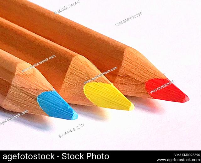 Three color pencils. Close view