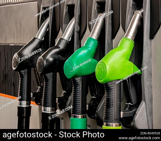 Fuel pistols at petrol station