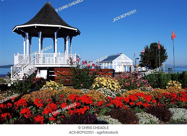Sidney waterfront bandstand with colourful flowers, Vancouver Island, British Columbia, Canada