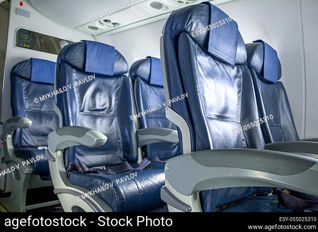 Interior of the plane. Empty chairs
