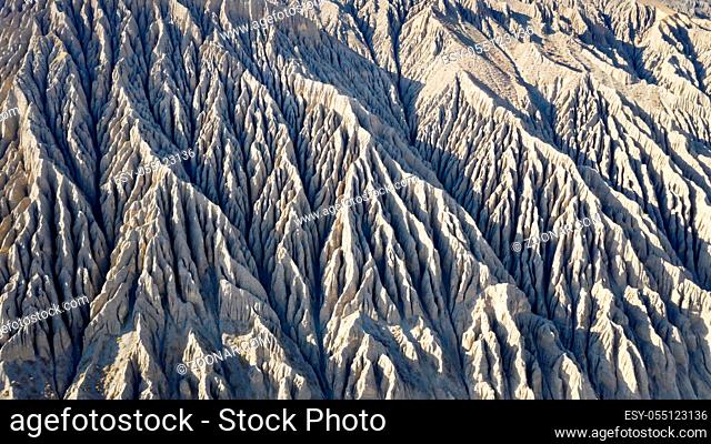 the gullies on the valley walls are carved into stone forests, dushanzi grand canyon, xinjiang