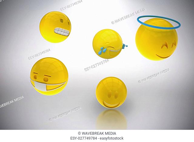 Composite image of three dimensional image of various smileys 3d