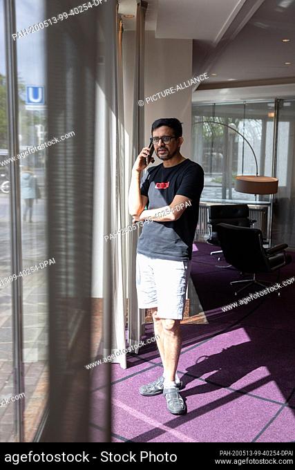 12 May 2020, Hamburg: Pratap Pillai, businessman from India, is standing in the lobby of the Hotel Europäischer Hof and is on the phone with a customer in...