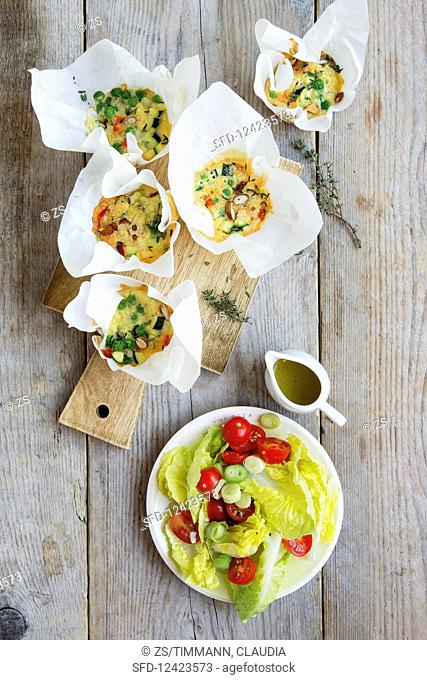 Vegetable muffins with a tomato and cos lettuce salad