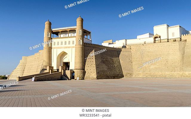 Exterior view of the 5th century Ark Citadel in Bukhara, a UNESCO world heritage site, large earthen fortification
