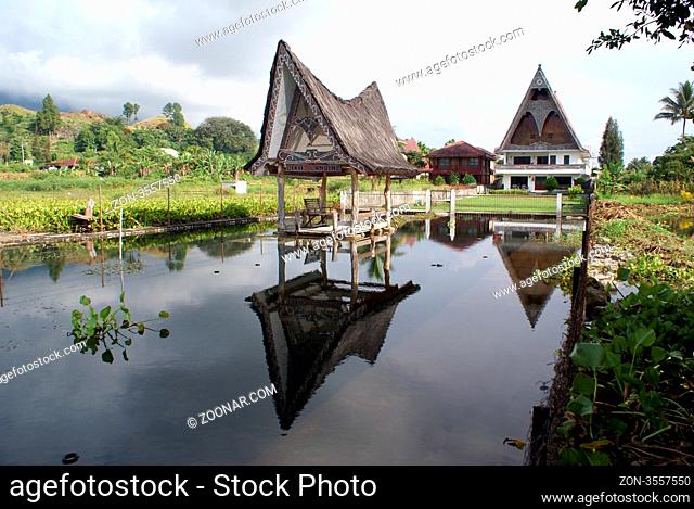 Pond and houses on the Samosir island, Sumatra