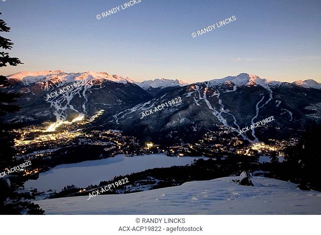 Whistler Village at dawn with Blackcomb Mountain and Whistler Mountain beyond, British Columbia, Canada