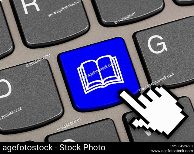 Computer keyboard with Book key - education background