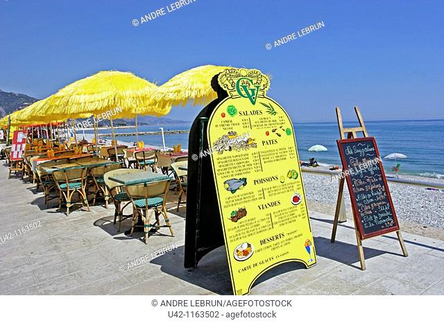 Cafe and beach in Menton on the Cote d'Azur in France