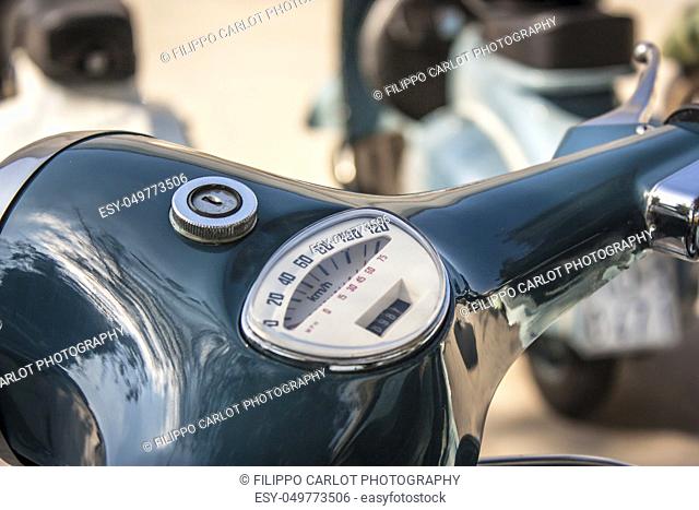 Detail of the handlebar and speedometer of a famous two-wheeled vehicle Italian: La Vespa. A piece of history of Italian vehicles