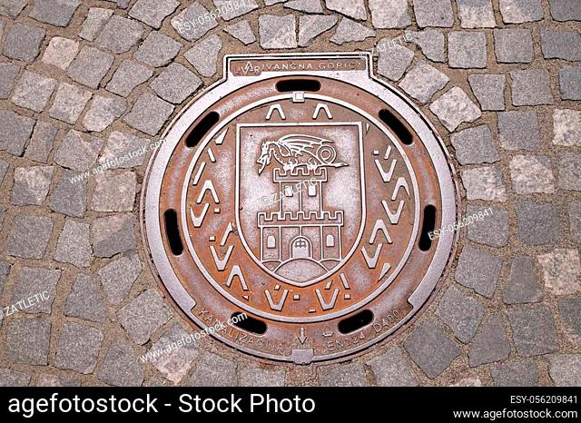 Hatch cover with the coat of arms of Ljubljana, Slovenia