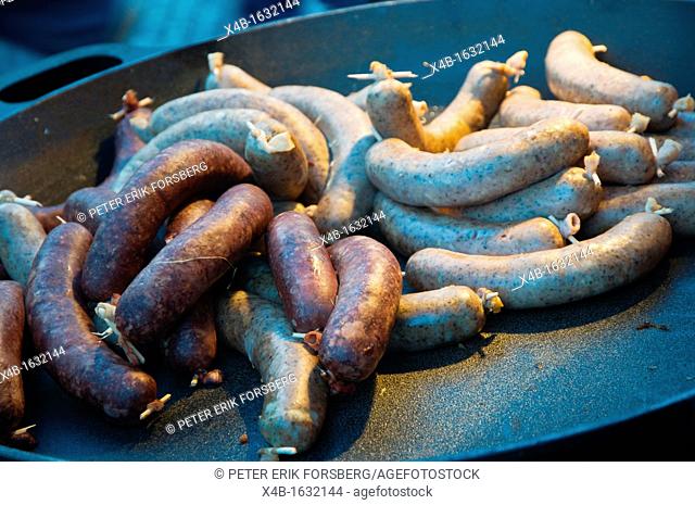 Sausages during Christmas market Vaclavske Namesti the Wenceslas Square new town Prague Czech Republic Europe
