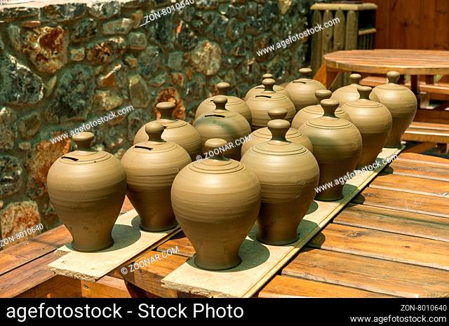 Many pots kept for drying in the sun