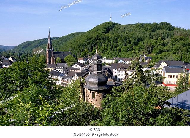 High angle view of buildings and church in town, Schleiden-Gemund, Eifel, North Rhine-Westphalia, Germany