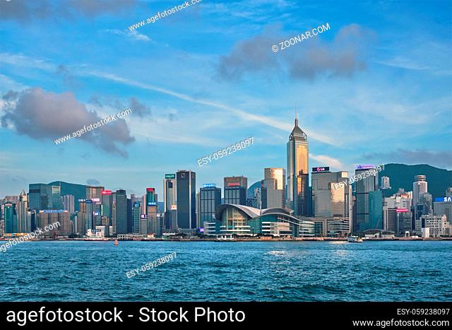 HONG KONG, CHINA - MAY 1, 2018: Hong Kong skyline cityscape downtown skyscrapers over Victoria Harbour in the day time with clouds. Hong Kong, China