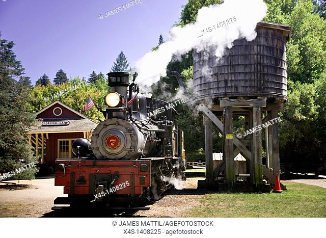 A steam train arrives at Roaring Camp depot