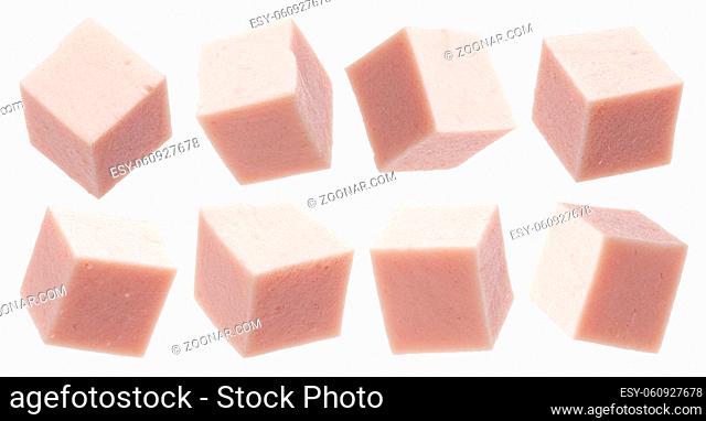 Boiled sausage cubes isolated on white background with clipping path