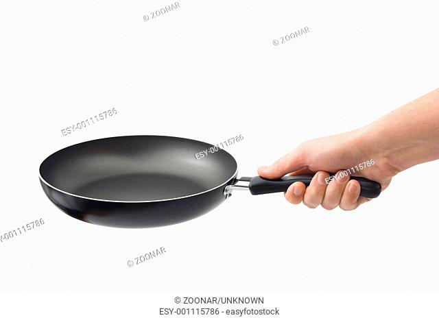 Hand and frying pan