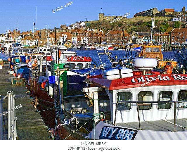 England, North Yorkshire, Whitby, Fishing boats moored in Whitby harbour