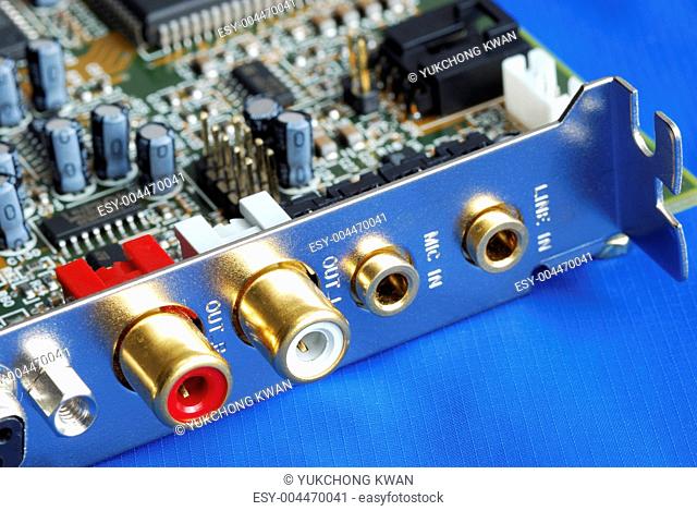 Close up view of a sound card isolated on blue