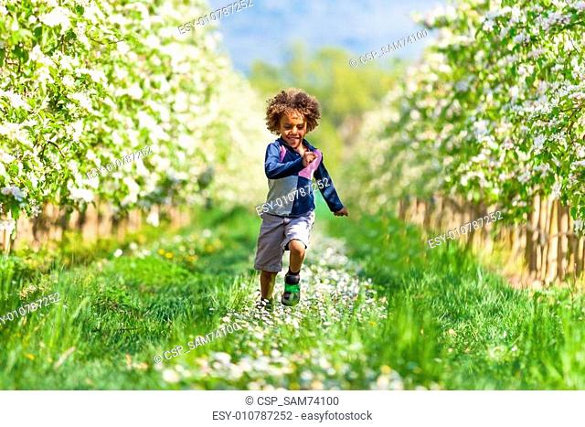 Cute african american little boy playing outdoor - Black people