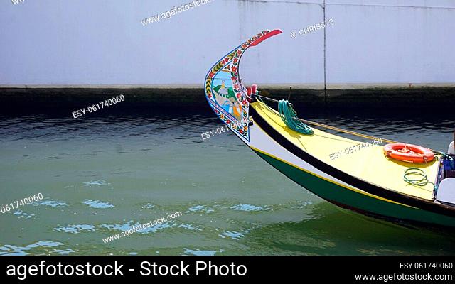 traditional painted wooden moliceiro boats in aveiro