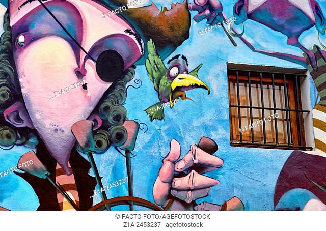 Funny graffiti of a pirate with a parrot. Denia. Alicante. Valencia Community. Spain