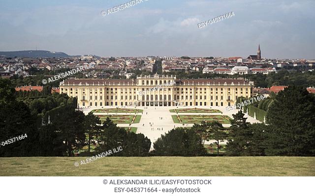 Vienna, Austria - July 06 2018: ""Schonbrunn"" palace (Schloss Schonbrunn) and the park with a blue sky and cloudsâ. “ Stock Editorial Photography