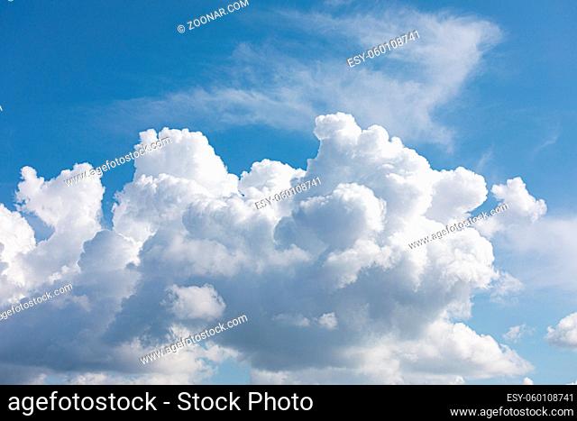 Fluffy cloud edge and blue sky cloudscape background