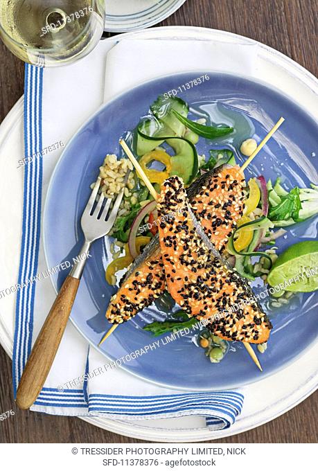 Salmon with a sesame seed crust on skewers