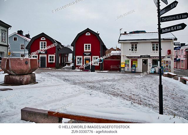 Businesses in traditional falun red timber buildings, Lilla Torget, Stockholm County, Sweden, Scandinavia