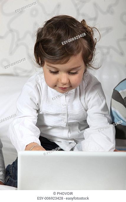 Toddler using laptop