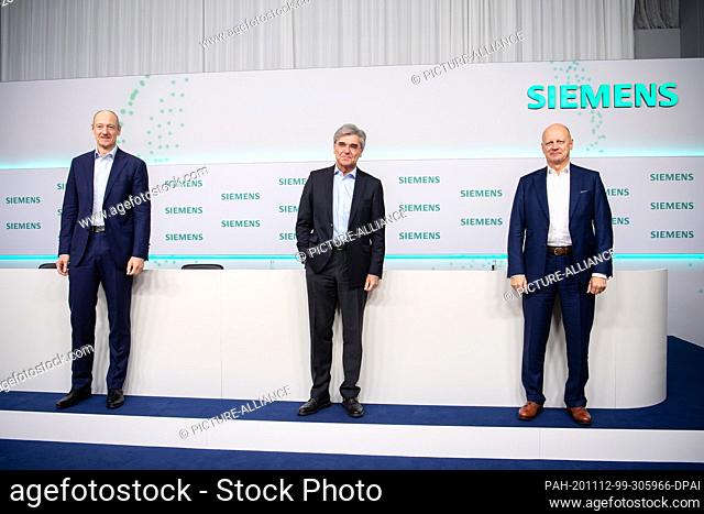 12 November 2020, Bavaria, Munich: Roland Busch (l-r), Vice Chairman of the Managing Board and member of the Managing Board of Siemens AG, Joe Kaeser