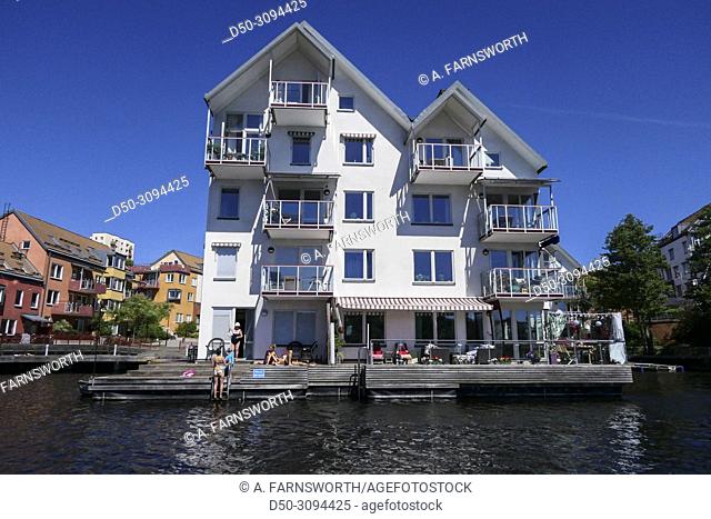 A house built on floatation devices at the Sickla lock and lake system, which joins the Baltic Sea with the Sickla and Jarla freshwater lakes