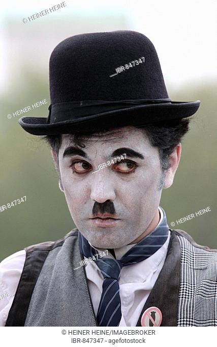Charlie Chaplin impersonator, funfair, carnival at the London Eye, London, England, Great Britain, Europe
