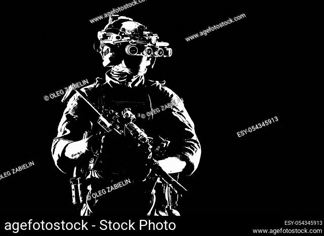 Army elite soldier with hidden behind mask and glasses face, in full tactical ammunition, equipped night vision device, radio headset, looking aside