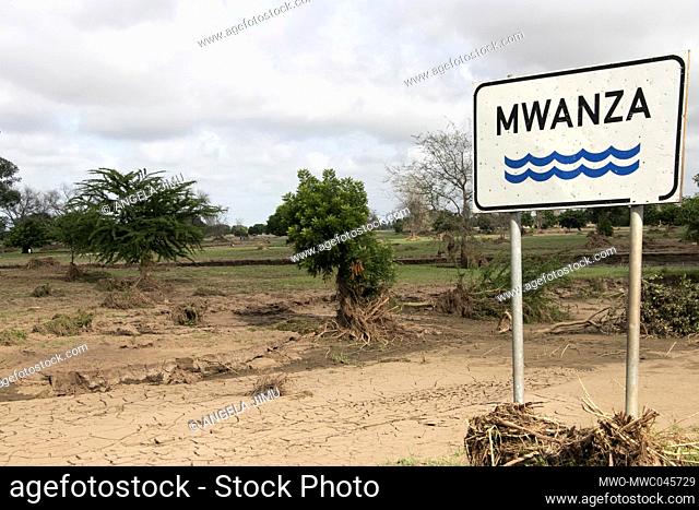 A signpost at Mwanza river in Malawi. The river is dry after flooding that occured earlier in the month. Malawi