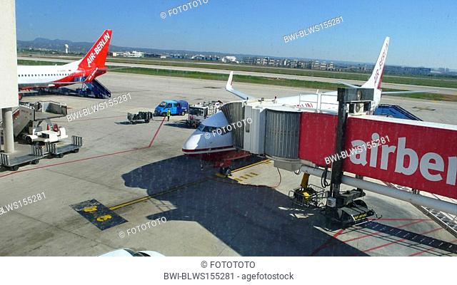 loading of an airplane with luggage and passengers, Spain, Palma