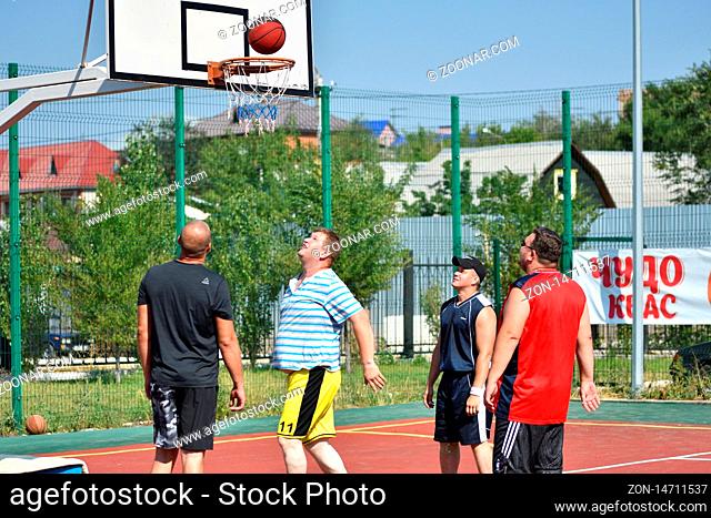 Orenburg, Russia - July 30, 2017 year: men play Street Basketball in the second round of the summer Street Basketball League