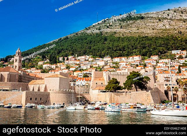DUBROVNIK, CROATIA - APRIL, 2018: Dubrovnik city old port marina and fortifications seen from Porporela