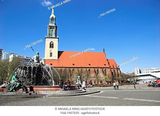 St -Marien-Kirche and Neptune Fountains at Alexanderplatz Berlin, Germany
