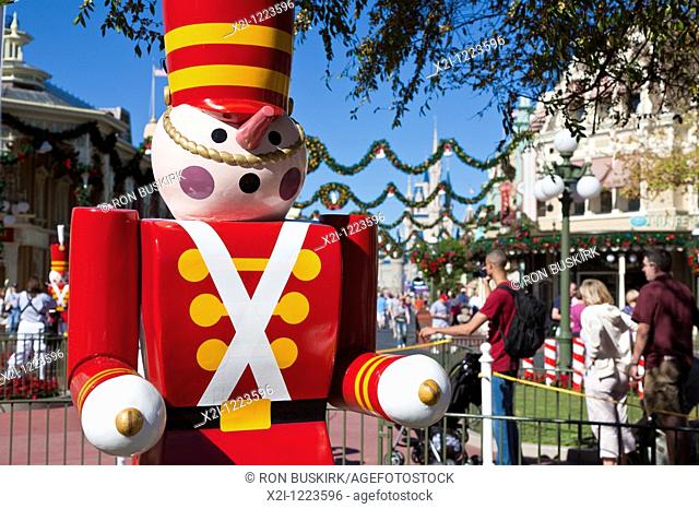 Kissimmee, FL - Nov 2009 - Bright red lifesize toy soldiers add to Christmas holiday decorations in the Magic Kindom at Disney World
