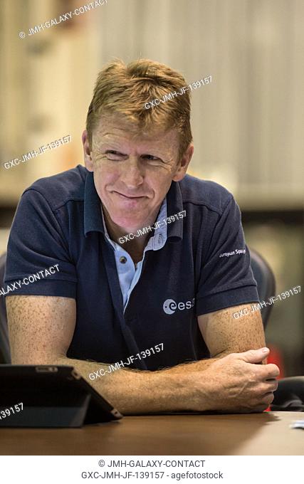 European Space Agency astronaut Timothy Peake, Expedition 4647 flight engineer, prepares for a training session in the Cupola trainer in the systems engineering...