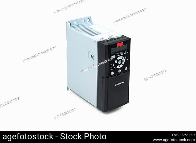 A new universal inverter for controlling the electric current and power for industrial on a gray white background. A frequency converter - rectifier - power...
